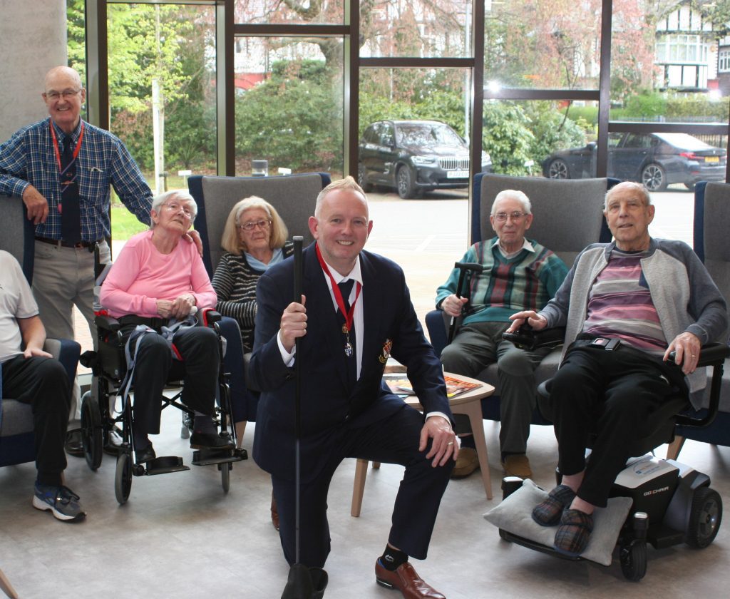 Paul Walsh, captain of Prestwich Golf Club, pictured with residents at Broughton House Veteran Care Village